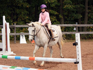 young girl jumping at show